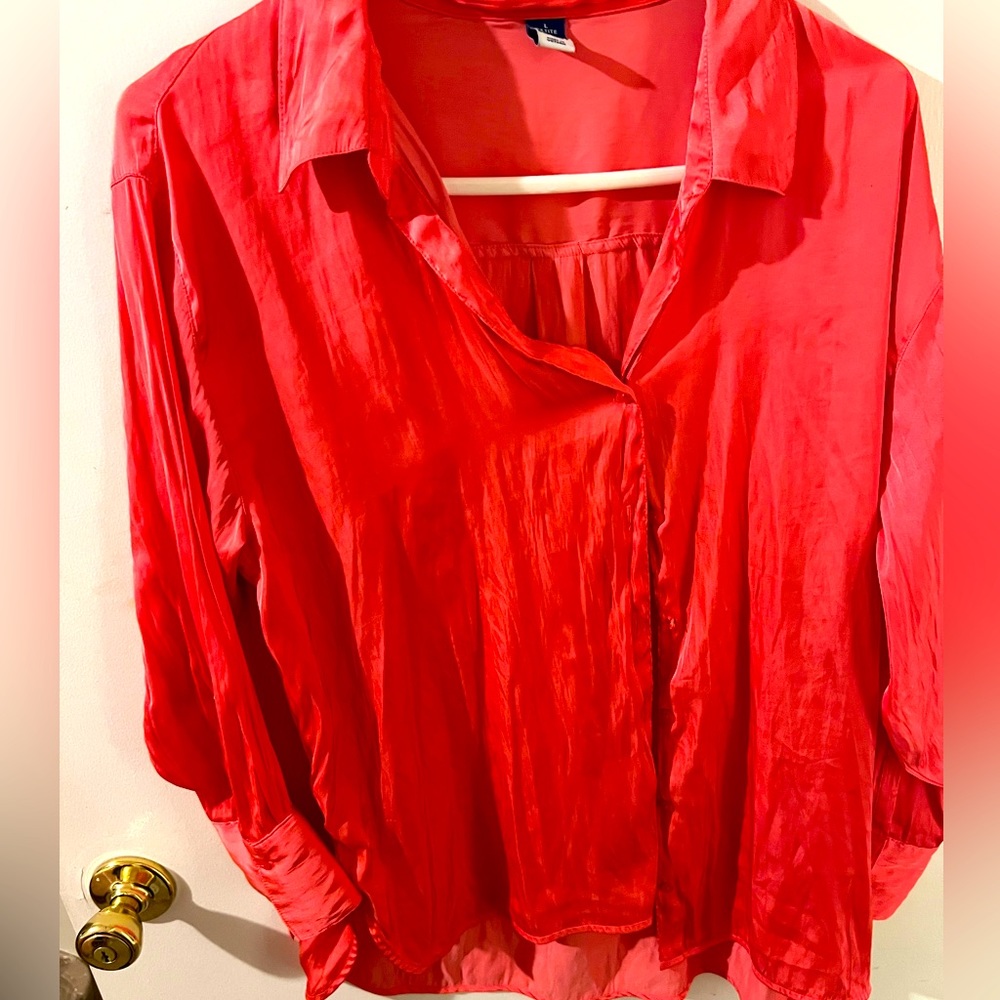 Bright pink very light long sleeve top, silk like feel, size large petite.